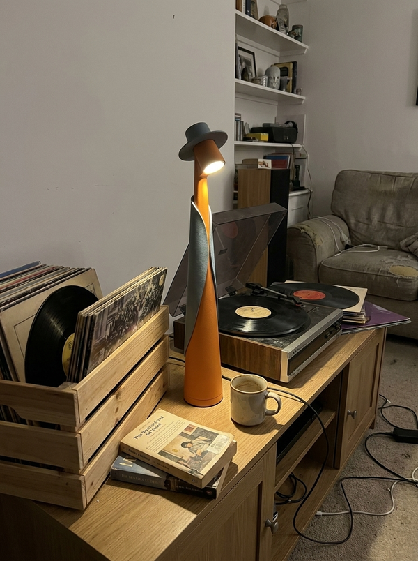 Dalfa Sculptural figure table lamp in a real home — giradischi