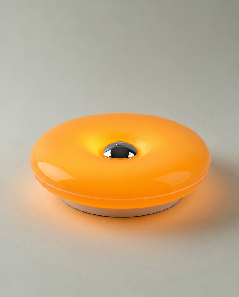 Donut Glow donut-shaped silicone table lamp, touch dimmer, USB rechargeable — lit hero shot | Dalfa CH/FR