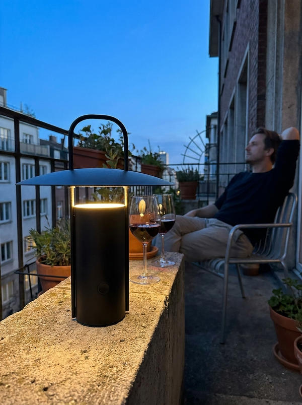 Dalfa Cylinder portable lantern table lamp in a real home — balcone tramonto
