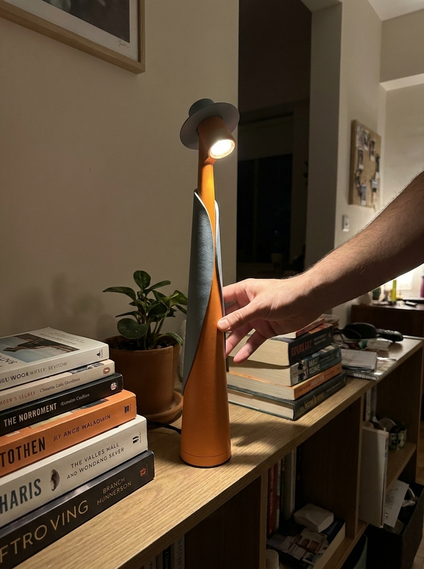 Dalfa Sculptural figure table lamp in a real home — touch mano