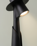 Close-up of the hidden LED spotlight under the hat brim, matte black figure lamp — detail | Dalfa CH/FR